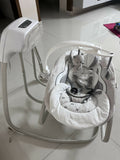 INGENUITY gliding swing and rocker with gentle gliding motion, cushioned seat, safety harness, and soothing design for relaxing, comforting, and entertaining babies.