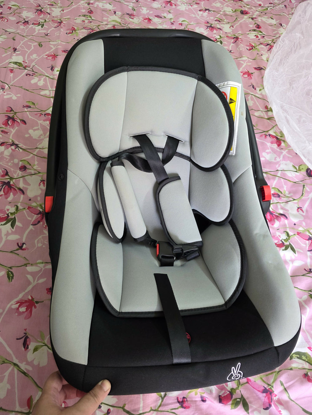 Infant Car Seat Cum Rocker for babies with dual-purpose design for car travel and supervised rocking.