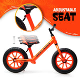 Orange balance bike with adjustable seat feature on an orange background