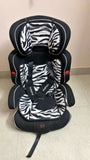 Zebra-patterned car seat on a beige floor