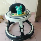 StarAndDaisy 3-in-1 baby walker with parent handle and musical tray, almost new condition