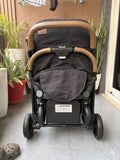KIDILO one-click foldable baby stroller with compact folding design, reclining seat, sturdy wheels, safety harness, and 20 kg weight capacity for comfortable baby travel.