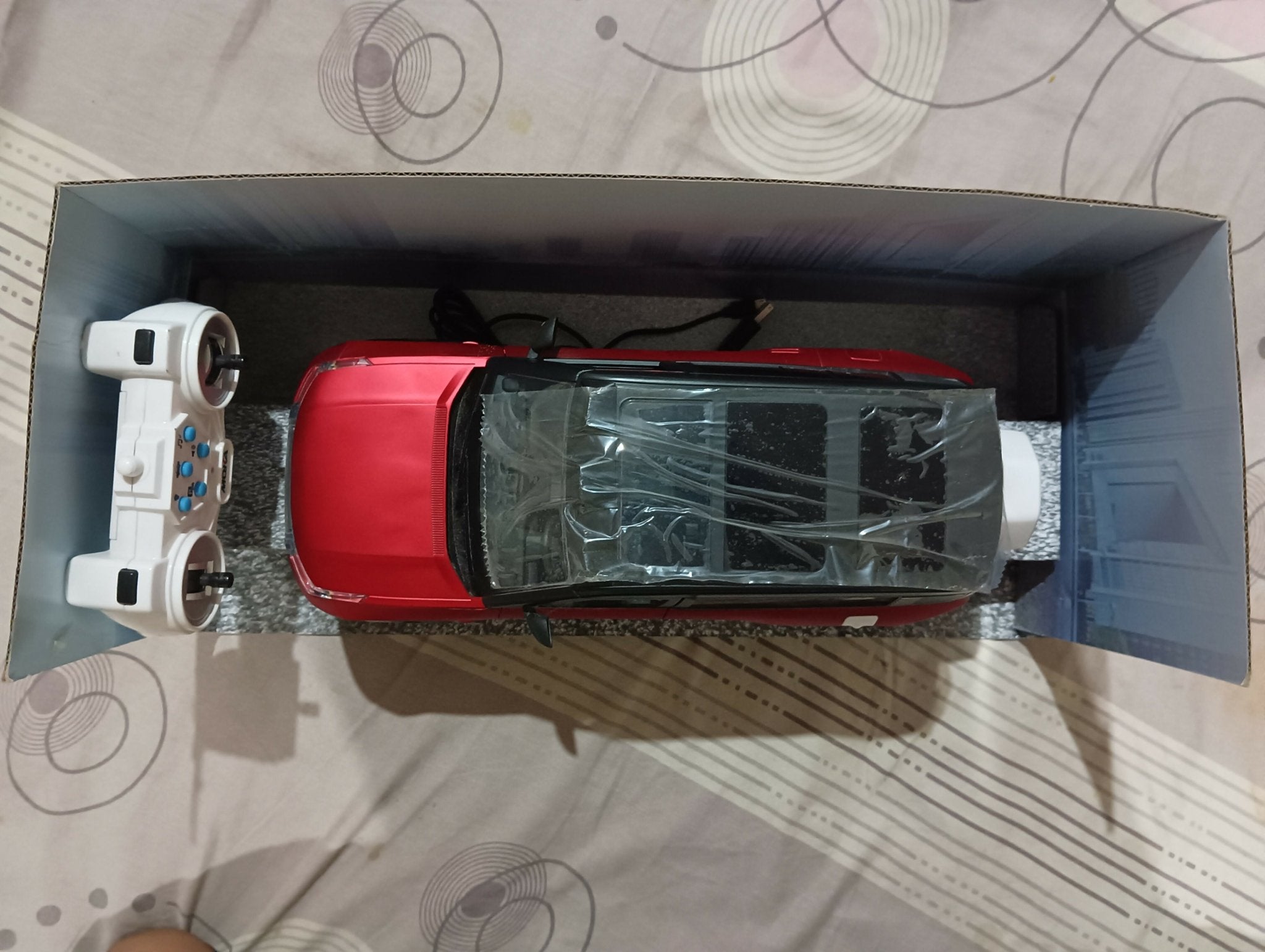 Kids electric ride-on car with rechargeable battery, realistic steering wheel, comfortable seat, LED lights, durable wheels, and fun driving features for exciting indoor and outdoor adventures.