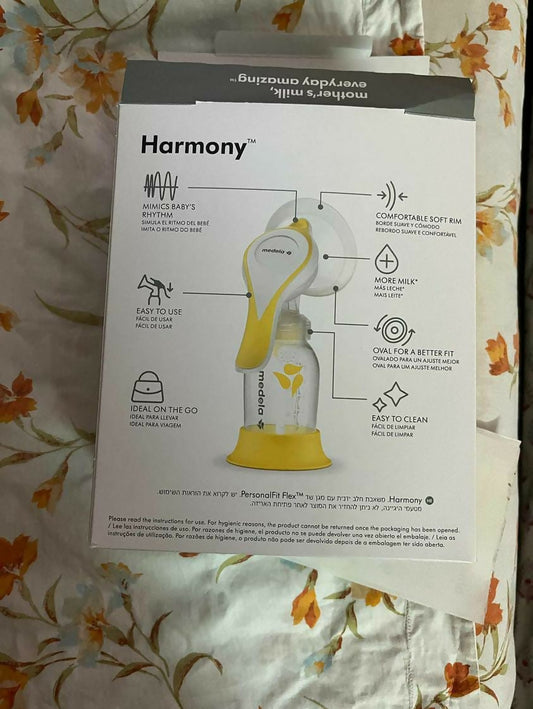 Effortlessly express breast milk with the MEDELA Harmony Manual Breast Pump, offering comfort, efficiency, and convenience for nursing mothers.