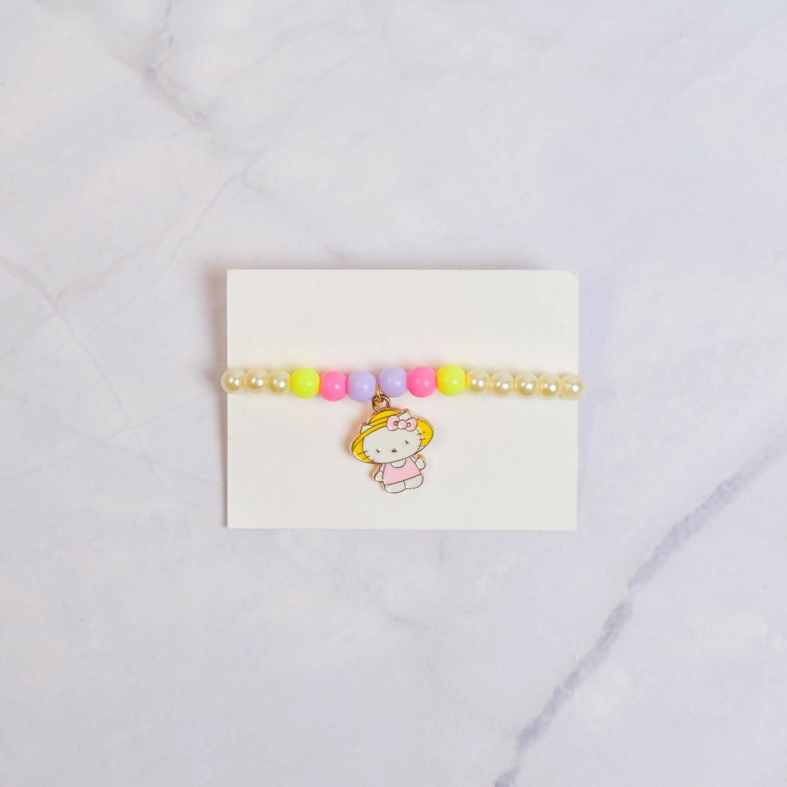 Whether they're fascinated by colors, love their favorite cartoon characters, or enjoy practical gifts, this rakhi is sure to make their day extra special.