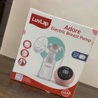 LUVLAP Adore Electric Breast Pump in Preloved New condition featuring convenient electric operation, adjustable pumping settings, comfortable breast cushion, and a compact, easy-to-use design for everyday breast milk expression.
