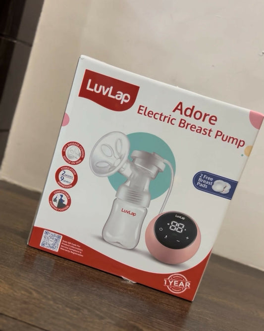 LUVLAP Adore Electric Breast Pump in Preloved New condition featuring convenient electric operation, adjustable pumping settings, comfortable breast cushion, and a compact, easy-to-use design for everyday breast milk expression.