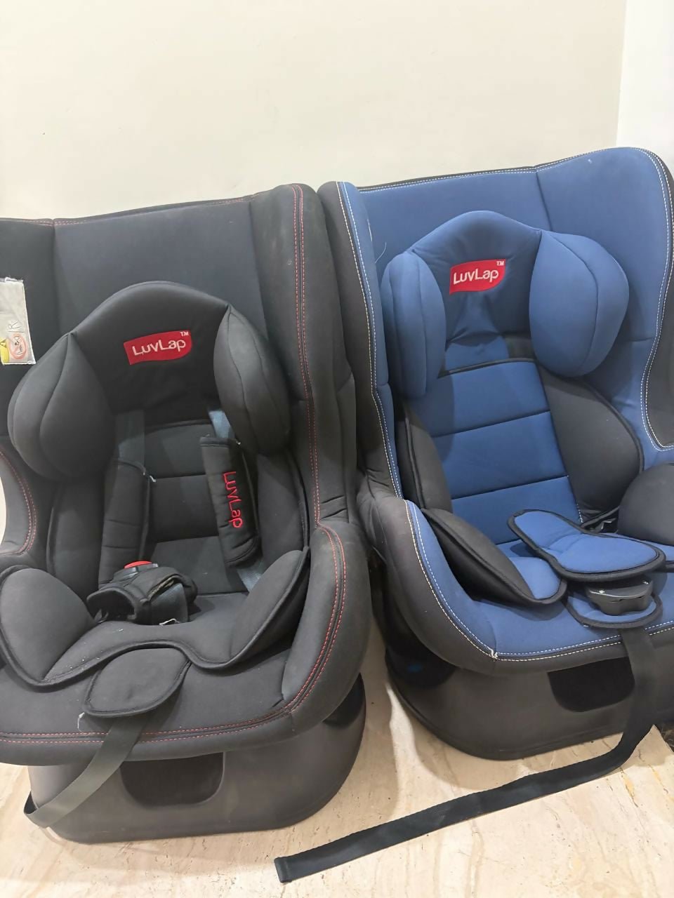 LUVLAP convertible car seat with rear and forward-facing modes, adjustable headrest, secure safety harness, side-impact protection, and cushioned comfort for growing children.