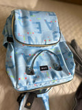 LuvLap diaper bag with multiple storage compartments, insulated bottle pockets, comfortable shoulder straps, durable fabric, and a spacious design for carrying baby essentials during travel and daily outings.