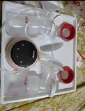 LuvLap double electric breast pump with dual pumping system, soft silicone shields, adjustable suction settings, and compact design for convenient milk expression.