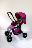 LUVLAP Galaxy reversible baby stroller in pink and black with foldable travel pram design, adjustable seat, canopy, and sturdy wheels for comfortable baby travel