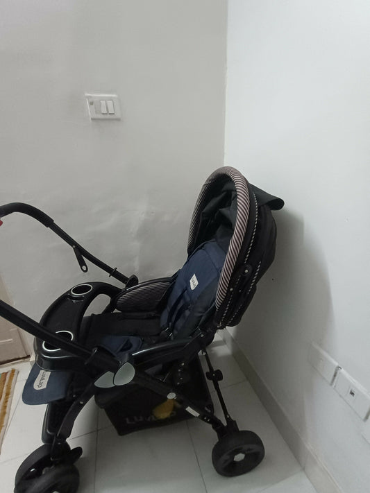LUVLAP Galaxy Baby Stroller/Pram with comfortable seating and protective canopy.