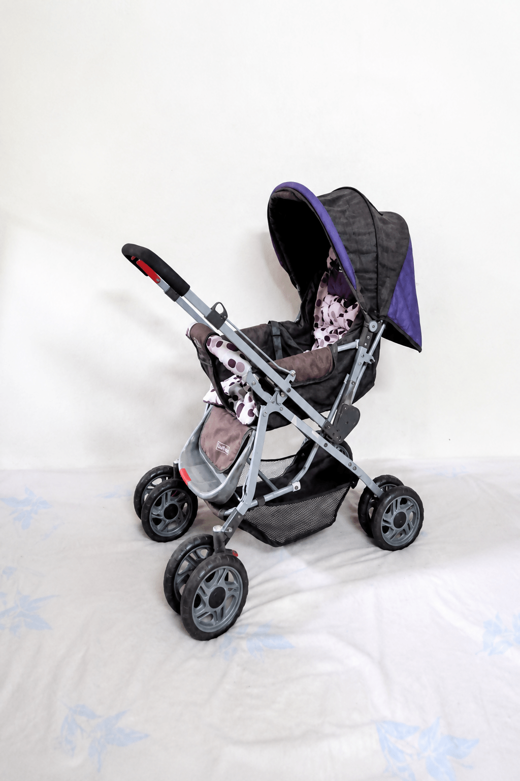 LUVLAP Sunshine reversible handle stroller with reclining seat, foldable baby pram design, safety harness, adjustable canopy, and comfortable travel support for babies and toddlers.