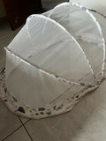 Large mosquito net made from fine breathable mesh with full-coverage protection, lightweight construction, and easy installation for cribs, beds, cots, or sleeping areas.