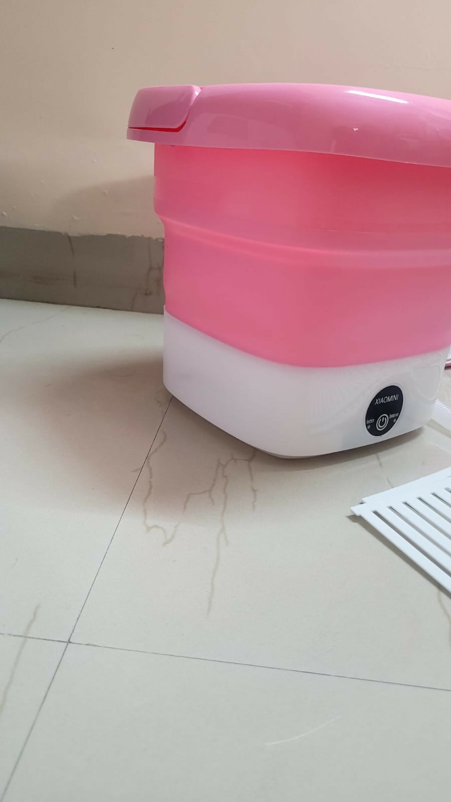 Experience ultimate laundry convenience with the Xiomini Portable Washing Machine, perfect for small spaces, travel, and efficient cleaning on the go.