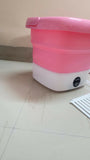 Experience ultimate laundry convenience with the Xiomini Portable Washing Machine, perfect for small spaces, travel, and efficient cleaning on the go.
