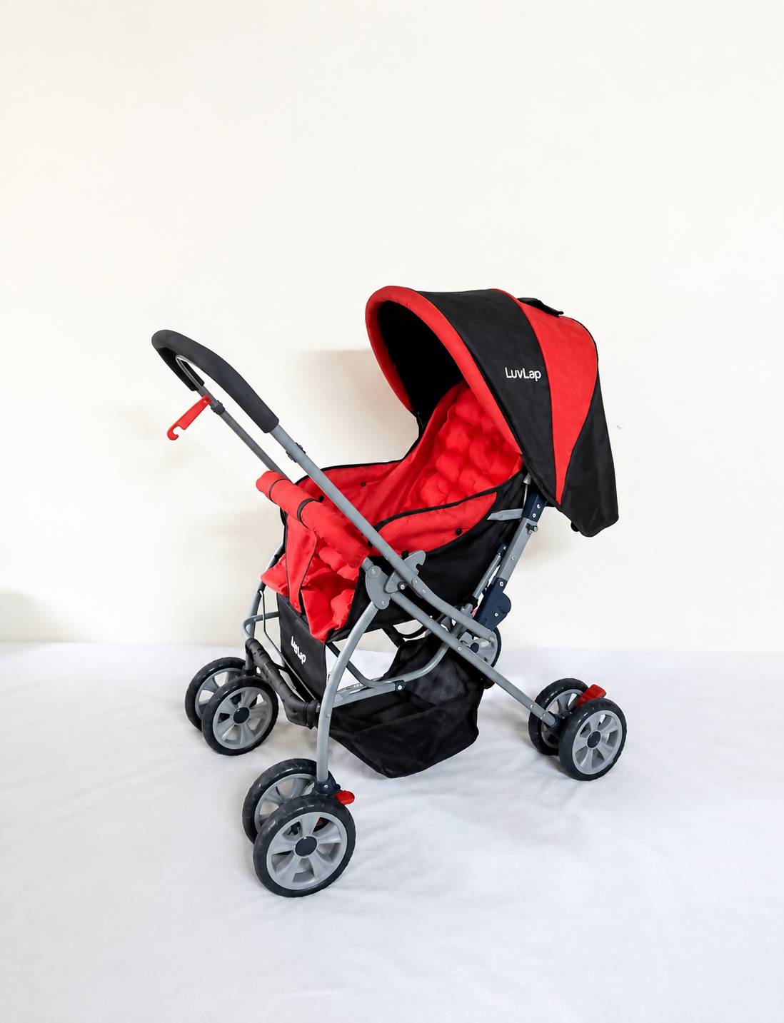 LuvLap foldable baby stroller with a reclining seat, 5-point safety harness, adjustable canopy, smooth wheels, and a lightweight design for comfortable everyday travel.