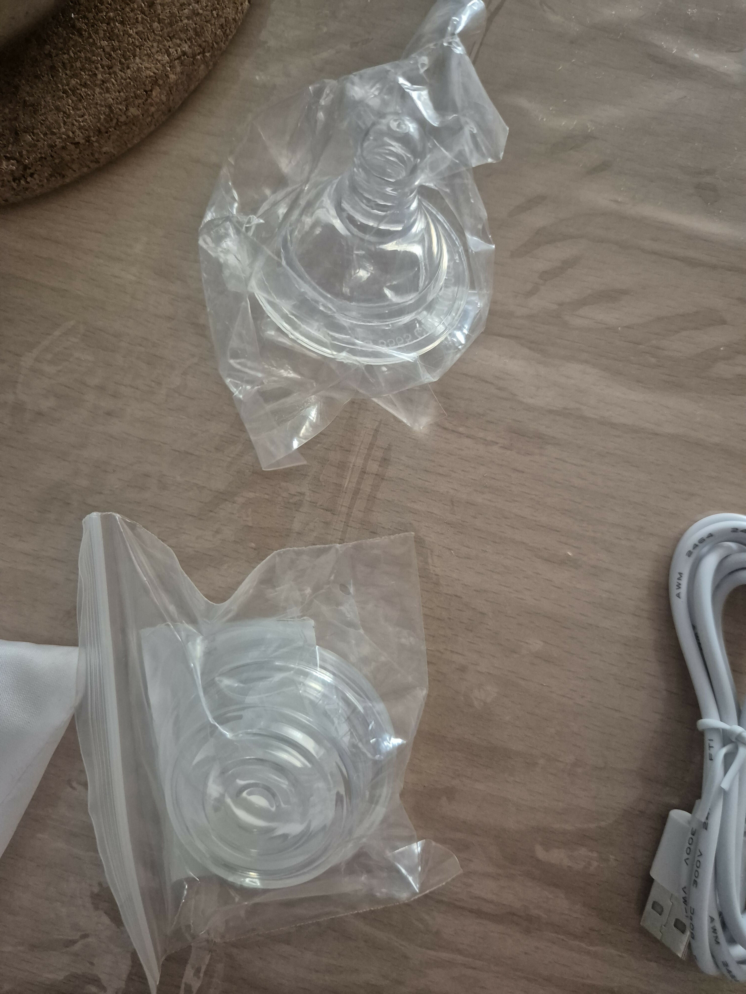 LuvLap Adore Single Electric Breast Pump with adjustable suction modes, soft silicone massage cushion, rechargeable battery, BPA-free components, and a lightweight portable design for comfortable milk expression.