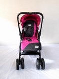 LUVLAP Galaxy reversible baby stroller in pink and black with foldable travel pram design, adjustable seat, canopy, and sturdy wheels for comfortable baby travel