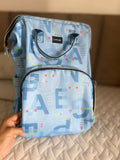 LuvLap diaper bag with multiple storage compartments, insulated bottle pockets, comfortable shoulder straps, durable fabric, and a spacious design for carrying baby essentials during travel and daily outings.