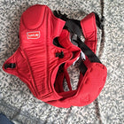 LuvLap Galaxy baby carrier in red with ergonomic support, adjustable straps, cushioned comfort, secure carrying design, and hands-free convenience for babies and parents.