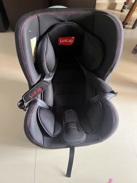 LuvLap Baby Car Seat with a 5-point safety harness, side-impact protection, adjustable headrest, cushioned seating, and ergonomic design for safe and comfortable travel with infants and toddlers.