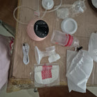 LuvLap Adore Single Electric Breast Pump with adjustable suction modes, soft silicone massage cushion, rechargeable battery, BPA-free components, and a lightweight portable design for comfortable milk expression.