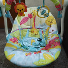 Mastela Deluxe Portable Swing Aqua with a comfortable cushioned seat, soothing swing motion, secure safety harness, compact foldable design, and calming features for babies.
