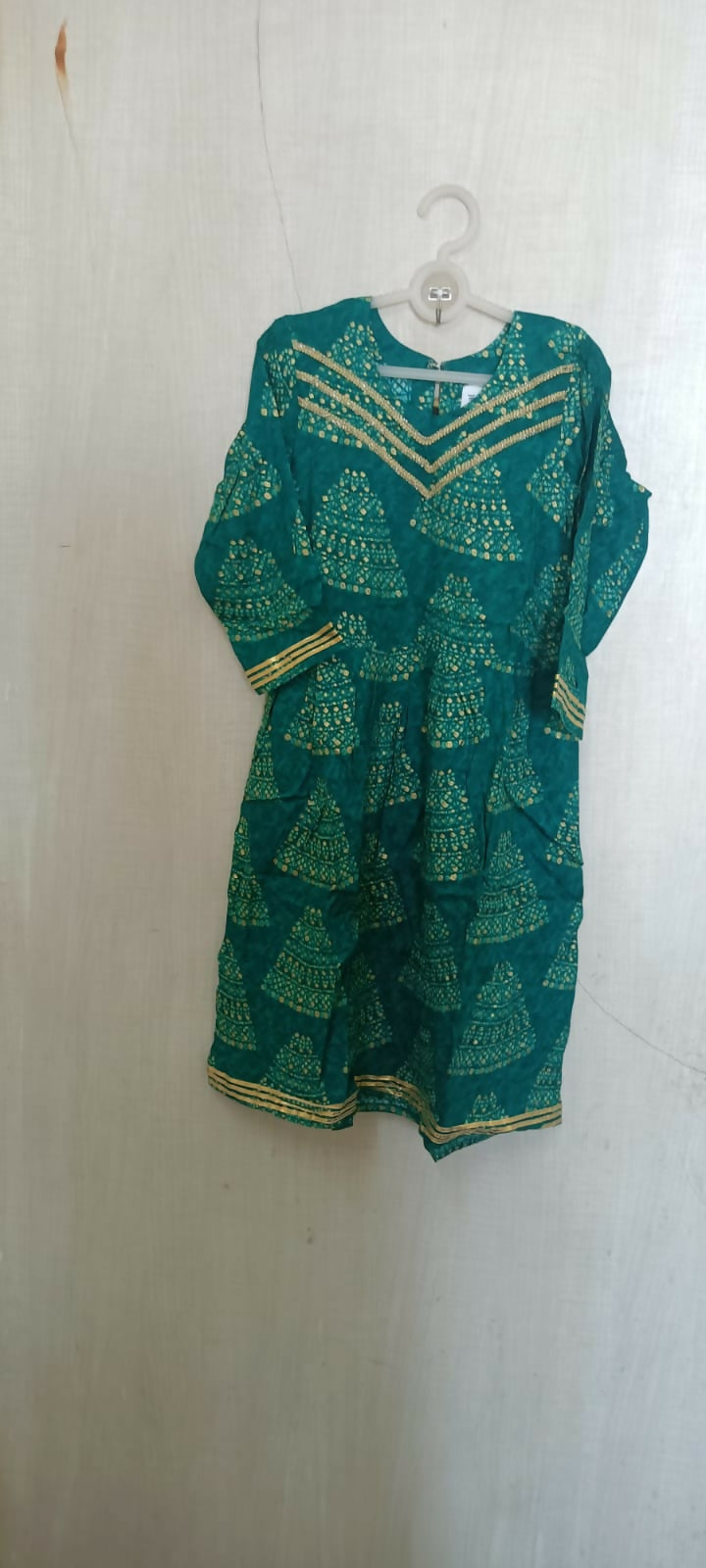 Make a style statement with our Beautiful Green Color Peplum Top and Garara Set, offering elegance and sophistication for festive occasions and parties.