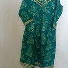 Make a style statement with our Beautiful Green Color Peplum Top and Garara Set, offering elegance and sophistication for festive occasions and parties.