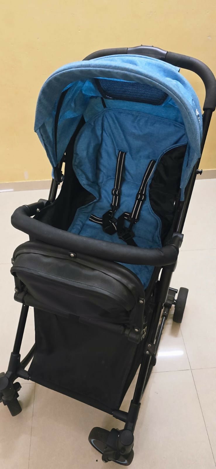 MEE MEE 2-in-1 stroller/pram with rocking function, foldable design, reclining seat, adjustable canopy, 5-point safety harness, smooth wheels, and storage basket for comfortable travel and soothing babies.