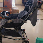 MEE MEE stroller and pram with rocker function, reclining seat, smooth wheels, safety harness, adjustable canopy, and dual stroller-to-rocker design for baby comfort and travel.