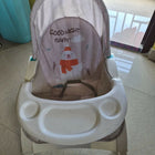 MISS & CHIEF Portable Baby Rocker & Bouncer with a comfortable padded seat, gentle rocking motion, safety harness, sturdy frame, and lightweight foldable design for babies.