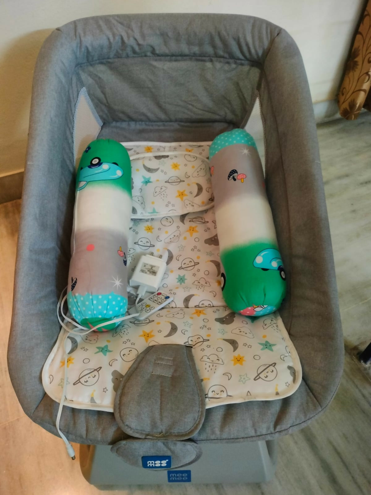 Mee Mee Electric Swing Rocker Chair in Grey, Almost New condition, available in Hyderabad, featuring gentle swinging and rocking motion, comfortable padded seating, safety harness, and supportive design for supervised baby relaxation and playtime.