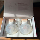 Momcozy S12 Pro Wearable Breast Pump with hands-free wearable design, adjustable suction levels, rechargeable battery, quiet operation, leak-resistant collection cups, and BPA-free components for comfortable milk expression.