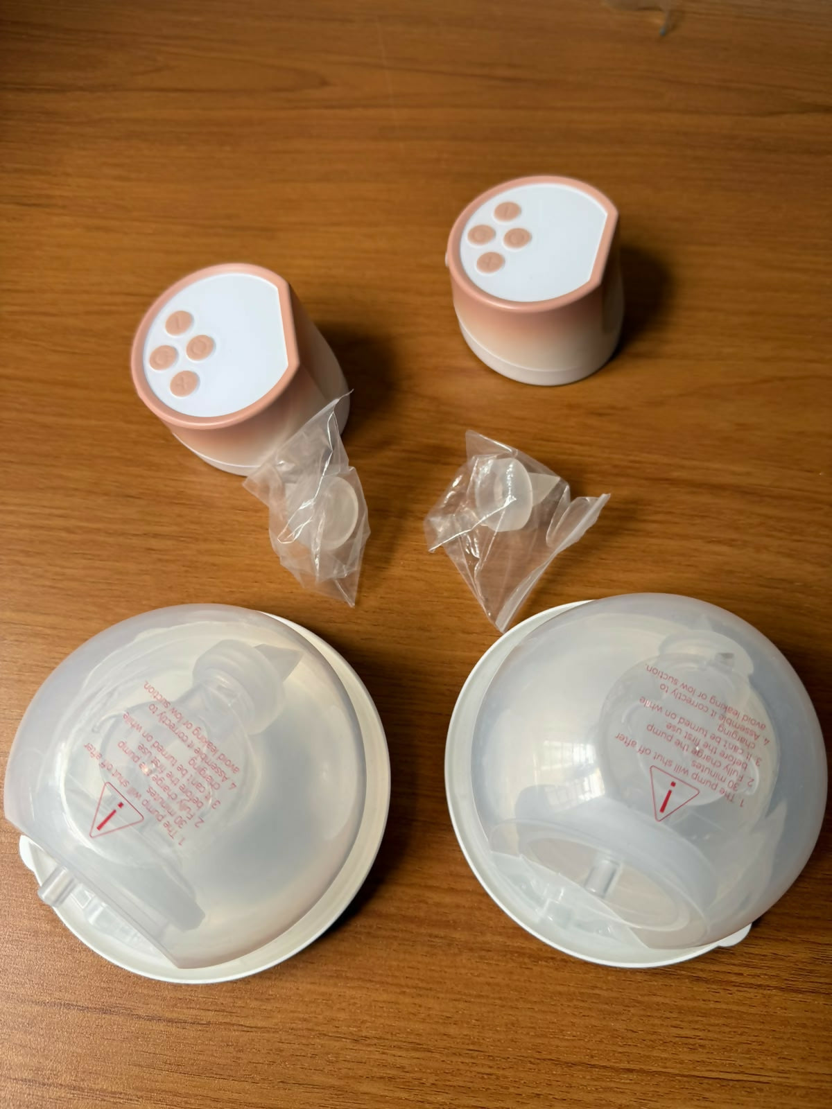 Momcozy S12 Pro Wearable Breast Pump with hands-free wearable design, adjustable suction levels, rechargeable battery, quiet operation, leak-resistant collection cups, and BPA-free components for comfortable milk expression.