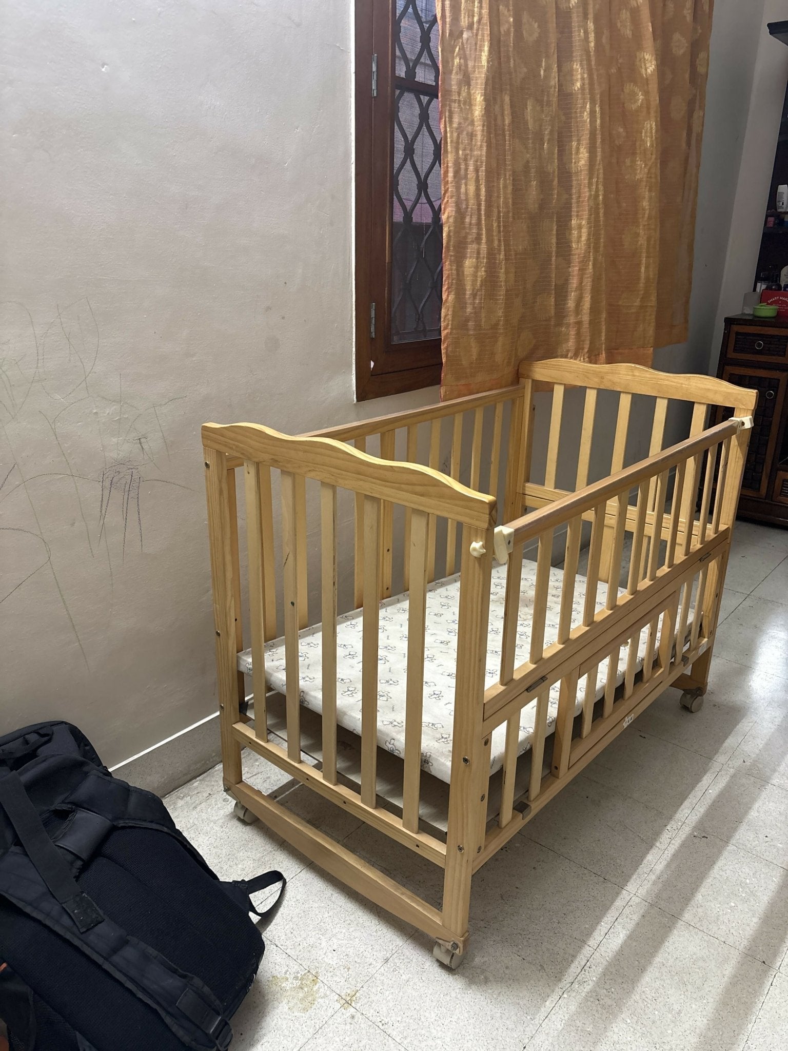 BABYHUG Montana cradle crib with sturdy construction, cozy sleeping space, secure side rails, and comfortable support for newborns, infants, and growing babies.