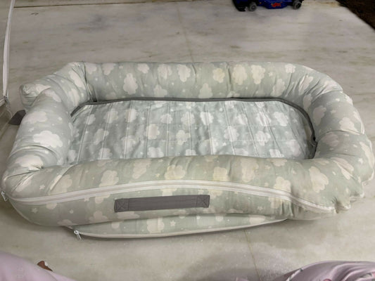 Mothercare Baby Cocoon with soft cushioned fabric, snug wrap design, and cozy support to keep newborns comfortable during sleep, rest, and travel.
