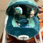 Create peaceful moments for your baby with the INFANTSO Baby Rocker Portable, featuring calming vibrations, a free mosquito net, and engaging musical toy for ultimate comfort and relaxation.