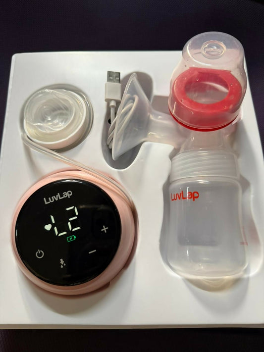 LuvLap breast pump set with digital display and USB cable on a white background
