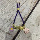 Personalized Bond Band Rakhi with charm featuring custom name personalization, decorative charm detail, comfortable band design, and a thoughtful keepsake for Raksha Bandhan celebrations.