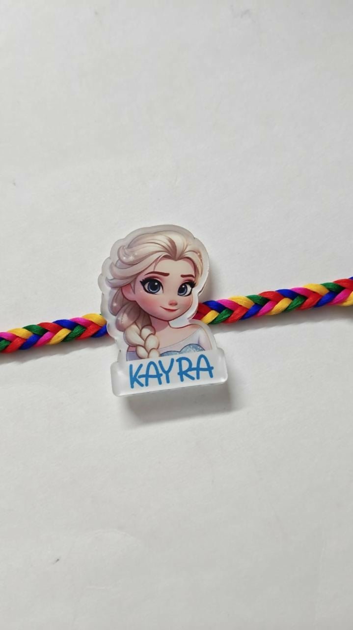 Personalized kids Rakhi featuring a custom name design, soft child-friendly materials, colorful embellishments, and a comfortable thread for celebrating Raksha Bandhan.