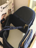 BUTT BABY Hip Seat Baby Carrier in Navy with an ergonomic hip seat, adjustable waist belt, padded shoulder support, breathable fabric, and secure design for comfortable babywearing.