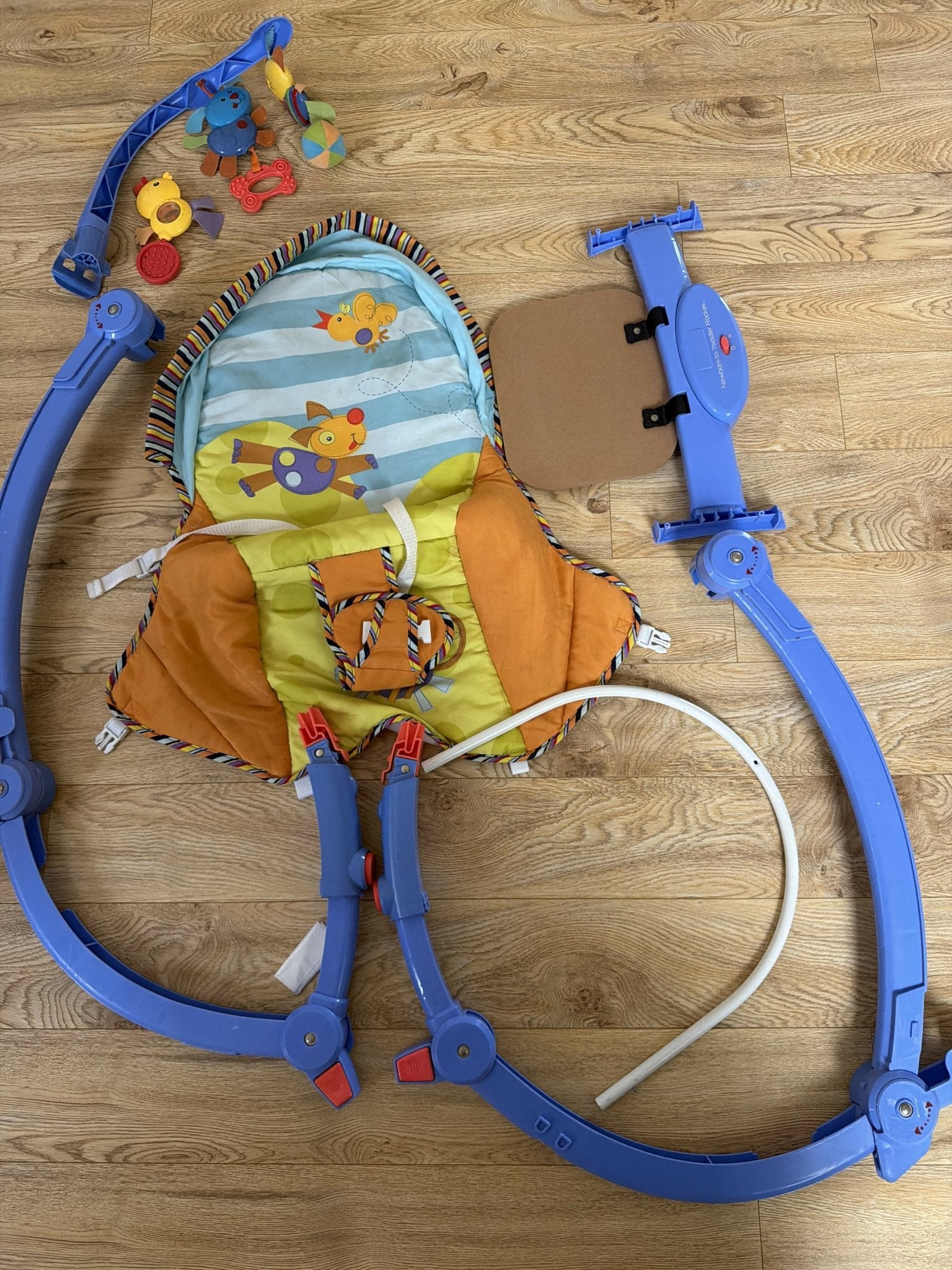 Newborn to Toddler Rocker Cum Chair with comfortable padded seating, adjustable reclining positions, gentle rocking function, safety harness, and convertible design for supervised play and relaxation as your child grows.