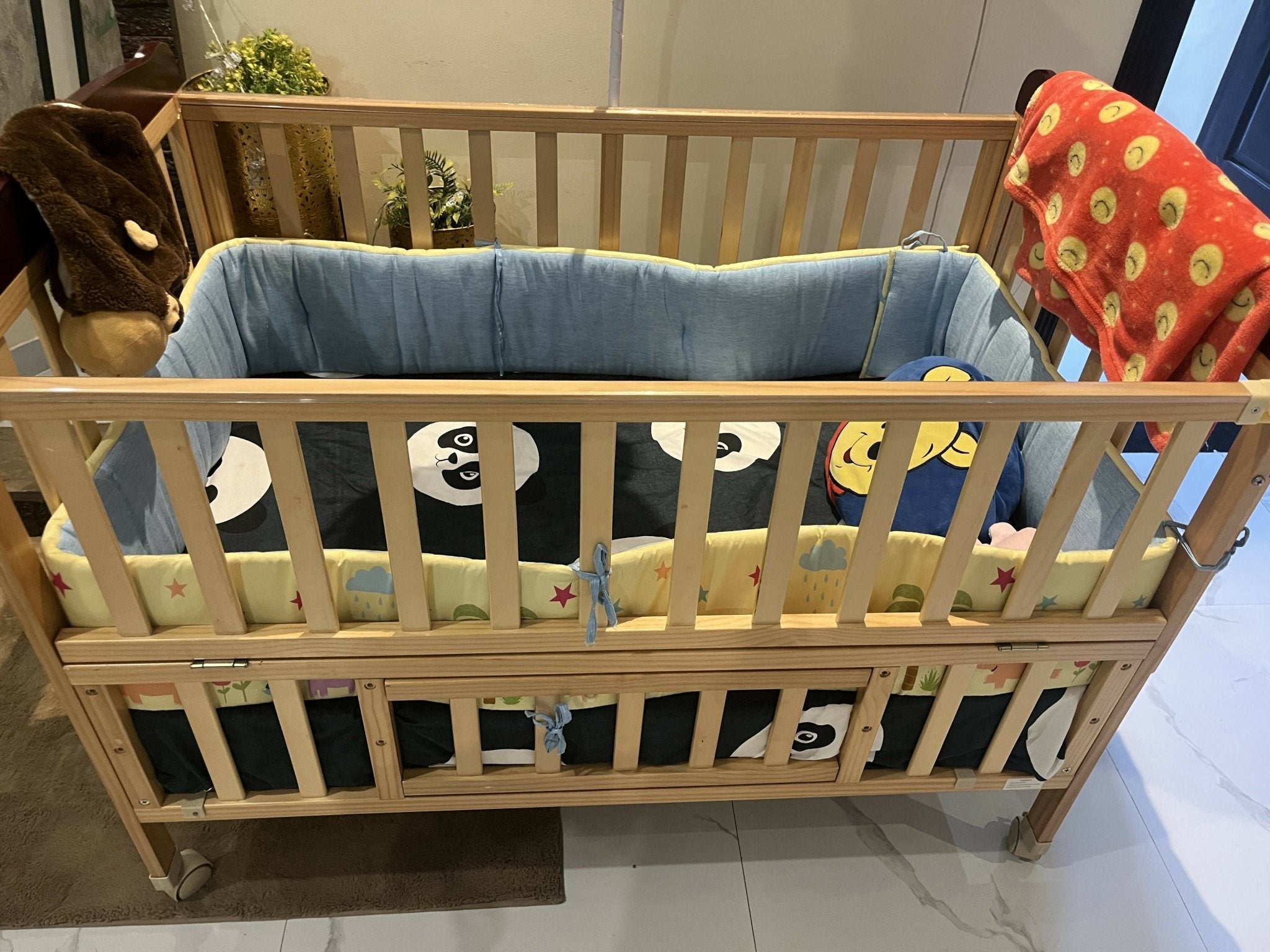 BABYHUG Hamilton baby cot with sturdy construction, spacious sleeping area, secure side rails, and comfortable support for newborns, infants, and growing babies.