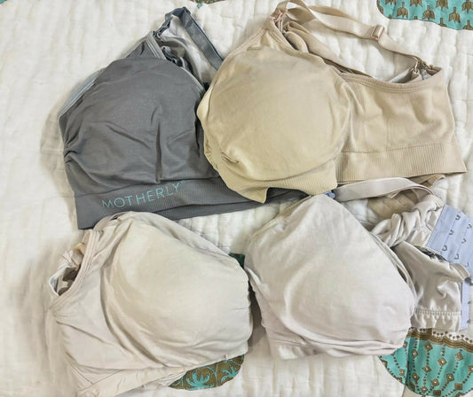 Set of 4 nursing/feeding bras (L/XL) with free breast pads – soft, padded, and non-wired for all-day comfort.