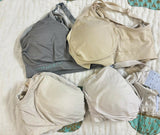 Set of 4 nursing/feeding bras (L/XL) with free breast pads – soft, padded, and non-wired for all-day comfort.