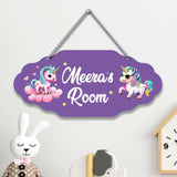 Purple sign with unicorn designs 