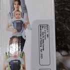 NOVELTY 4 in 1 Baby Carrier in Almost New condition featuring multiple carrying positions, adjustable straps, padded support, secure fastening, and a practical hands-free design for comfortable everyday baby carrying.