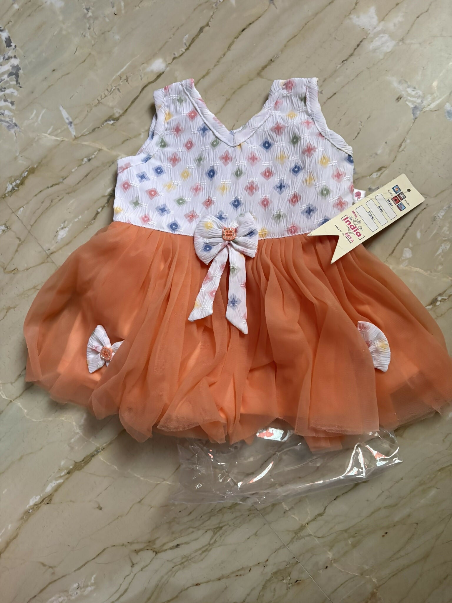 Brand new baby girl orange dress frock featuring soft comfortable fabric, charming design, and a comfortable fit for everyday wear, birthdays, and special occasions.